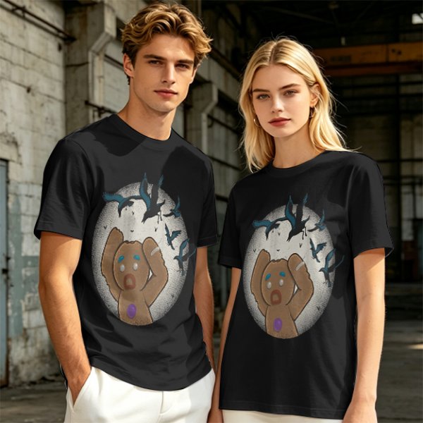 Olive T-shirt with a terrified gingerbread man and flying birds graphic