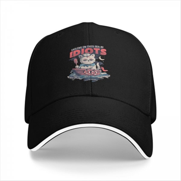 Black baseball cap with sailing cat graphic and 'Sailing in this sea of idiots' text