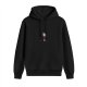 Black hoodie with small cartoon graphic on chest