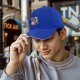 Black baseball cap with Kirby and assorted pastries graphic