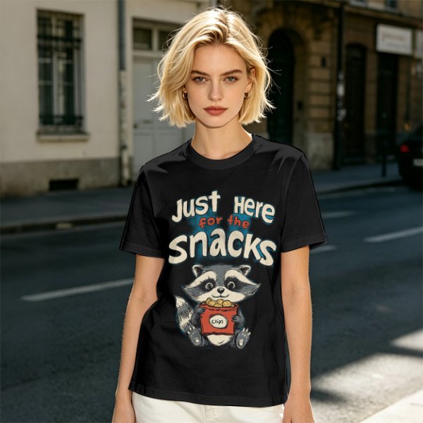 Olive green t-shirt with 'Just Here for the Snacks' and raccoon graphic