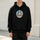 Black hoodie with Totoro graphic holding a small plant