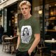 Olive green graphic t-shirt with bedridden cartoon girl and 'DAILY' text