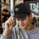 Black baseball cap with Slimer's Ghostbusters themed graphic print