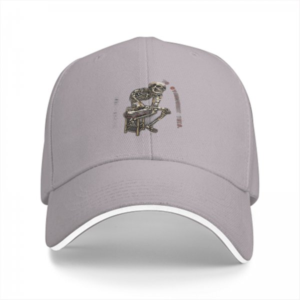 Black baseball cap with skeleton sitting on stool graphic