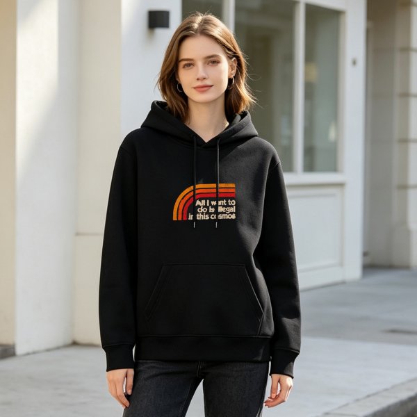 Black hoodie with retro rainbow and 'All I want to do is illegal in this cosmos' text
