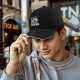 Black baseball cap with 'Fueled by Coffee & Existential Dread' grim reaper graphic