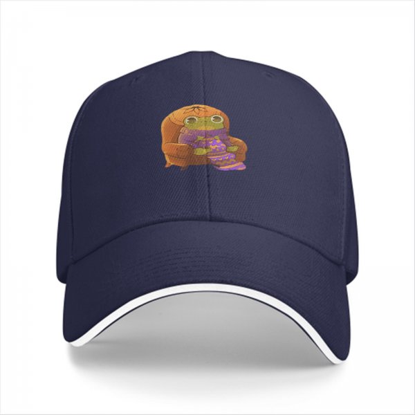 Black baseball cap with a cozy frog sitting in an armchair graphic
