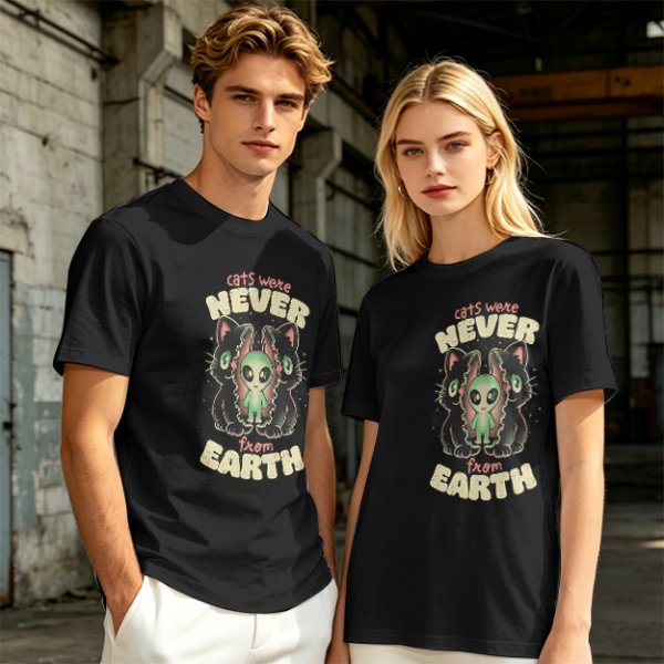 Olive green graphic t-shirt with 'cats were never from earth' alien and cat print