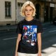 Olive t-shirt with Kiki's Delivery Service window print of girl reading letter