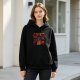 Black hoodie with horror themed graphic print of characters and text