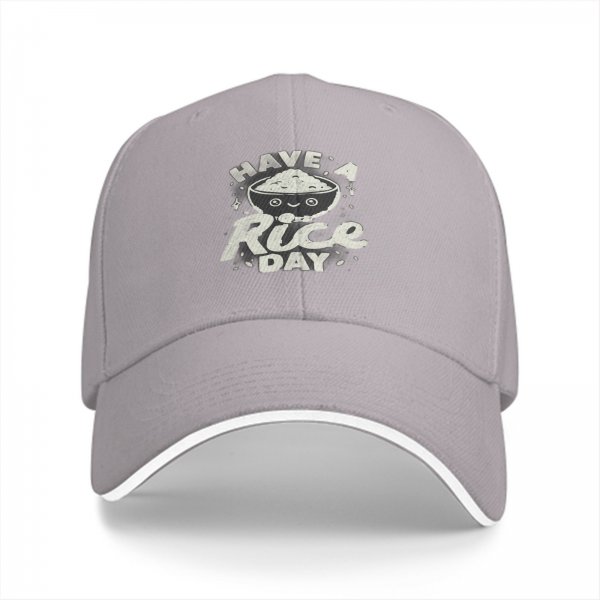 Black baseball cap with 'Have A Rice Day' kawaii rice bowl graphic