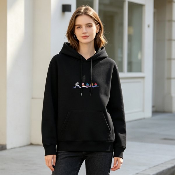 Black hoodie with cute cartoon sea creature graphic design