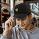 Black baseball cap with cute sad vegetable graphic print