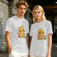 Olive T-shirt with mischievous orange cat knocking over green cup print