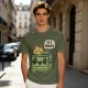 Olive green t-shirt with a cartoon dumpster on fire saying I'm a phoenix