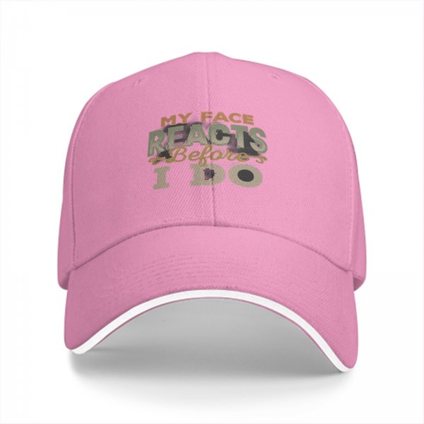 Black baseball cap with 'My Face Reacts Before I Do' printed design