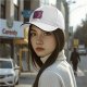 Black baseball cap with pink and purple bear graphic print