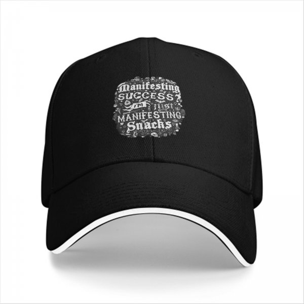 Black baseball cap with 'I'm manifesting snacks' text print