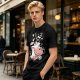 Olive green t-shirt with 'SUPER MOO' and cartoon cow graphic