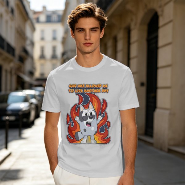 Olive t-shirt with cartoon dog and 'God has allowed me to live another day' print