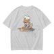 Olive T-shirt with a stressed cartoon cat baking cookies