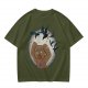 Olive T-shirt with a terrified gingerbread man and flying birds graphic