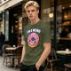 Olive green t-shirt with sad donut graphic and 'I'M A WEIRD' text