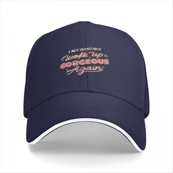 Black baseball cap with 'I accidentally woke up gorgeous again' text