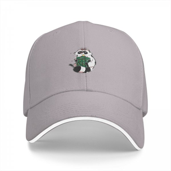 Black baseball cap with cute raccoon holding a decorated Christmas tree