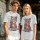 Olive t-shirt with a raccoon eating snacks and 'powered by pure spite and snackies' text