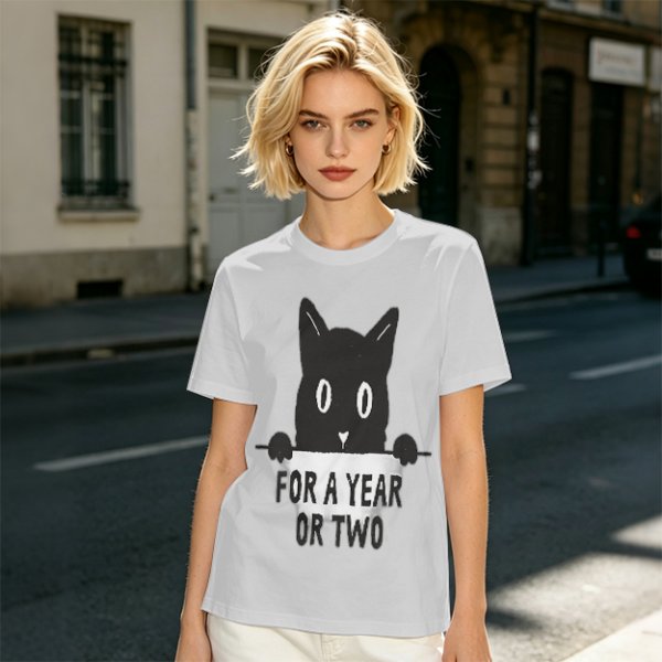 Olive graphic t-shirt with black cat holding 'for a year or two' text