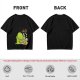 Olive Green T-Shirt With Cute Green Creature Preparing Peas Graphic