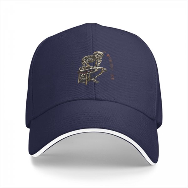 Black baseball cap with skeleton sitting on stool graphic