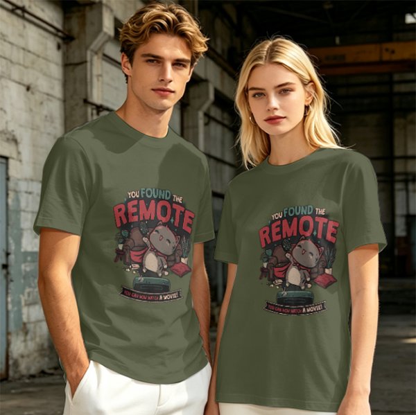 Olive t-shirt with cat graphic and 'You Found The Remote' movie text