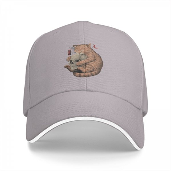 Black baseball cap with orange cat hugging skull and crescent moon print
