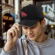 Black Baseball Cap With Playful Black Cat Red Graphic Design
