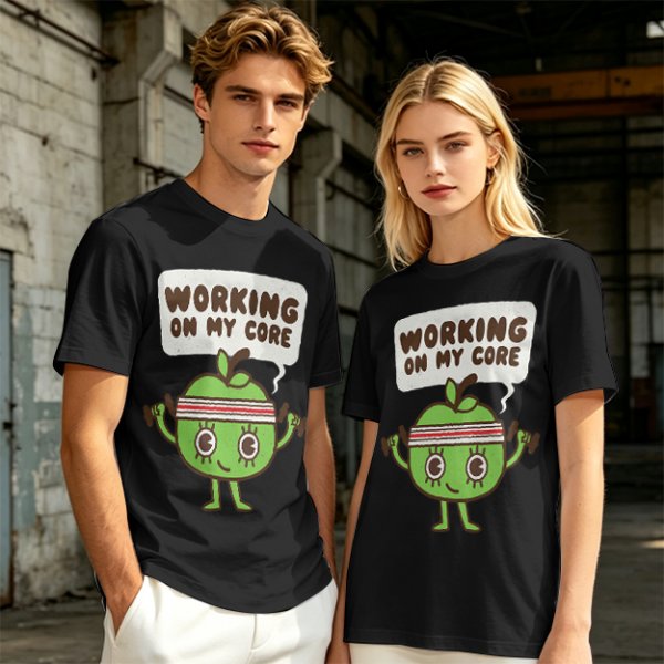 Olive green t-shirt with cartoon apple lifting dumbbells and 'Working on my core' text