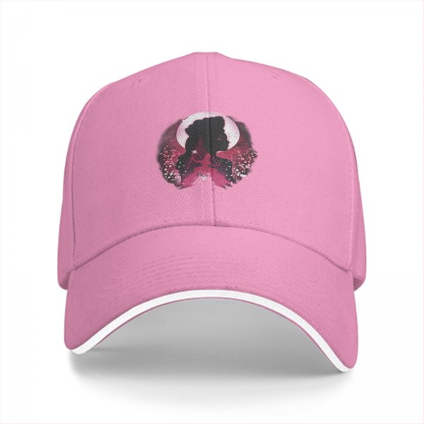 Black baseball cap with pink moon and princess silhouette graphic